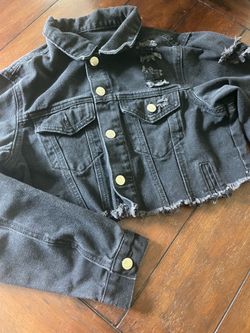 Cropped black distressed denim jacket