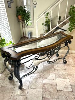 Console table with removable glass top and iron frame and legs with marble down 65” long 22” deep 34” height good condition