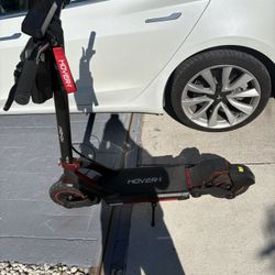 Standing riding scooter