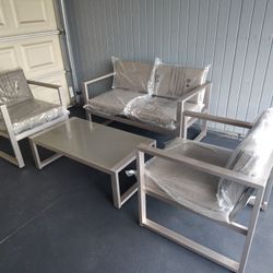 Outdoor patio loveseat with 2 chairs and coffee table 