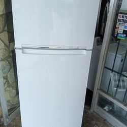 Apartment Size Whirlpool refrigerator And Top Freezer 