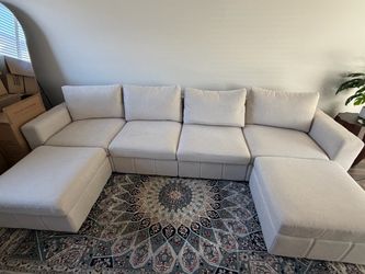 REDUCED-Cream modular sectional with 2 ottomans, machine washable covers