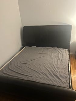 King size bed with leather headboard and footboard