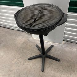 George Foreman standing outdoor, electric grill… $50