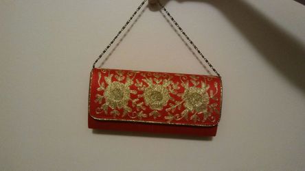 Red with gold embroidery clutch bag