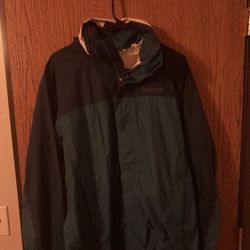 MARMOT rain Hooded Rain Jacket. Large Different Blues In Color. Zip Up, Pockets In An Out. 