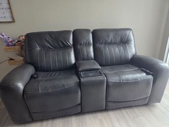Fully automatic reclining, heated, and massaging love sofa