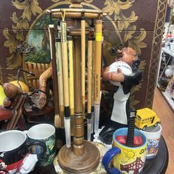 Set of Chinese calligraphy brushes on a wooden stand