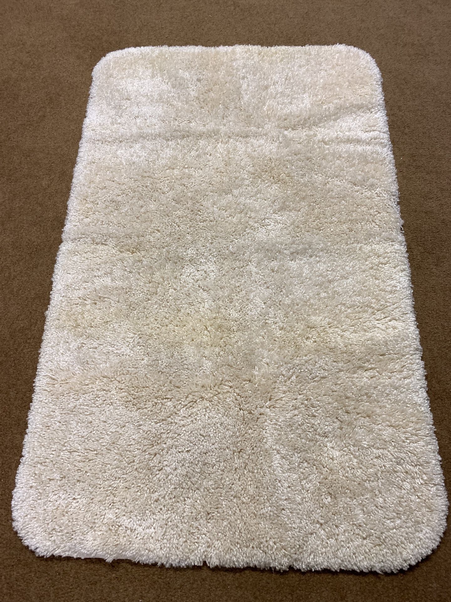 Rug 25” x 40” Cream Color with non skid backing