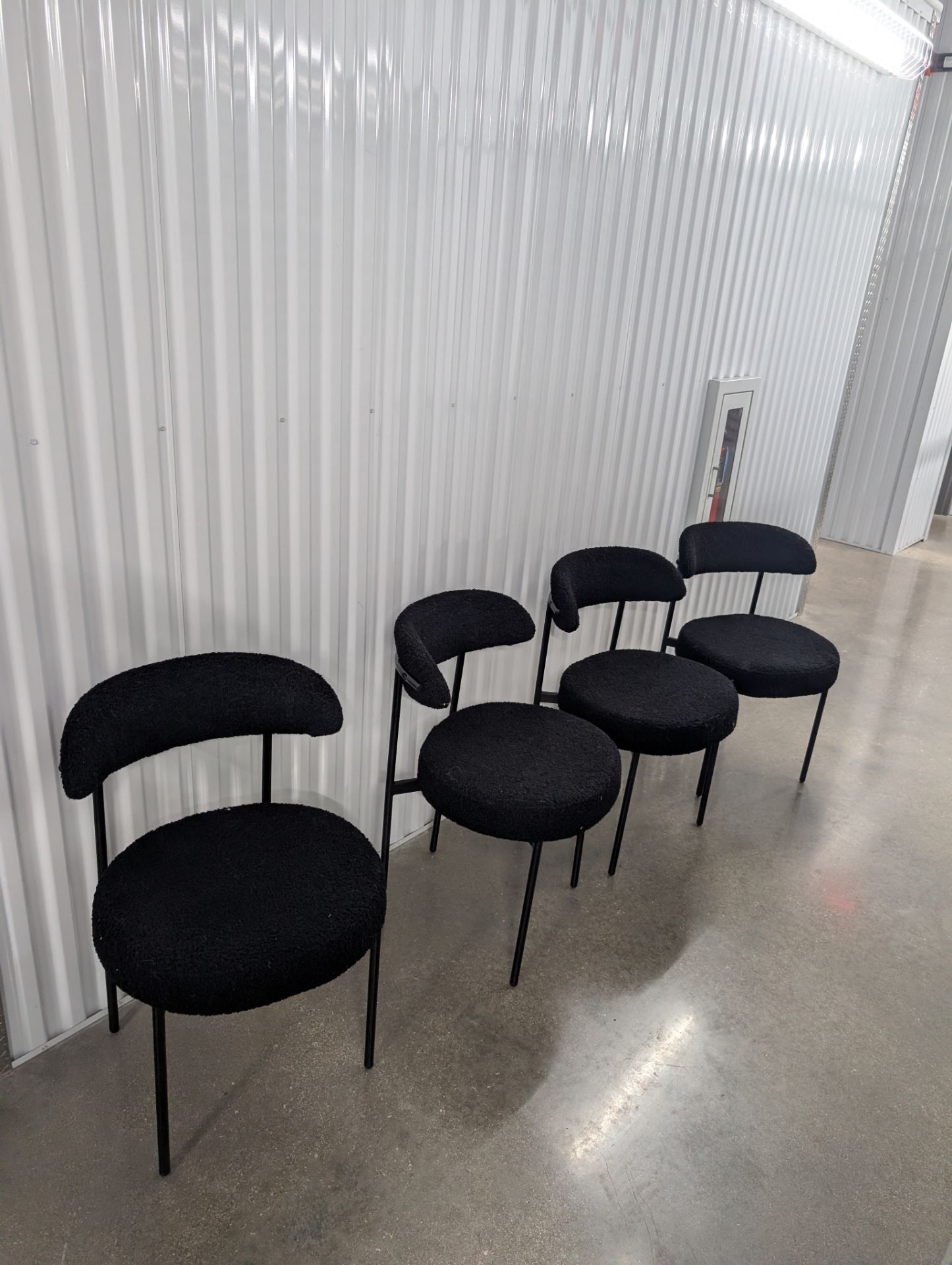 Black boucle dining chairs (set of 4) and dining table