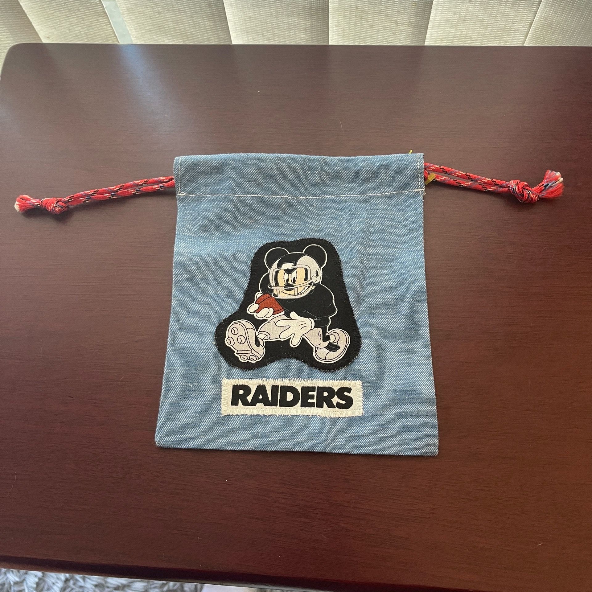 Light blue Mickey Mouse, Raiders bag