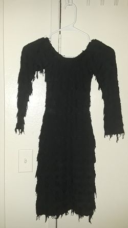 black fringe dress size X Small this dress has been with me for 30 years. super nice. nice licra material