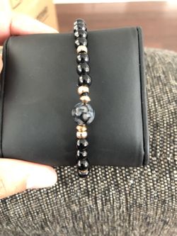 Obsidian Stone Bracelet with Golden Metal Details