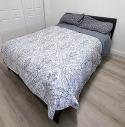 Bed with mattress and mattress cover