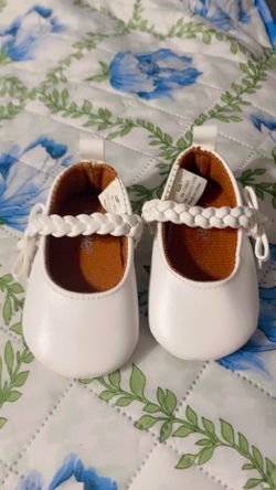 White baby shoes