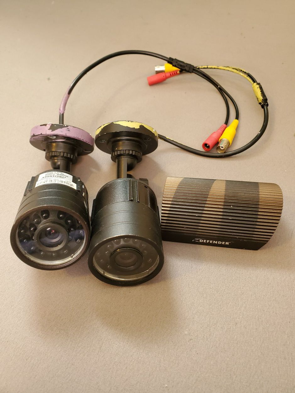 2 HiRes Defender outdoor security cameras