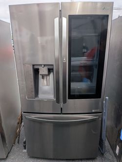 Counter depth LG refrigerator/3 months of warranty and free local delivery