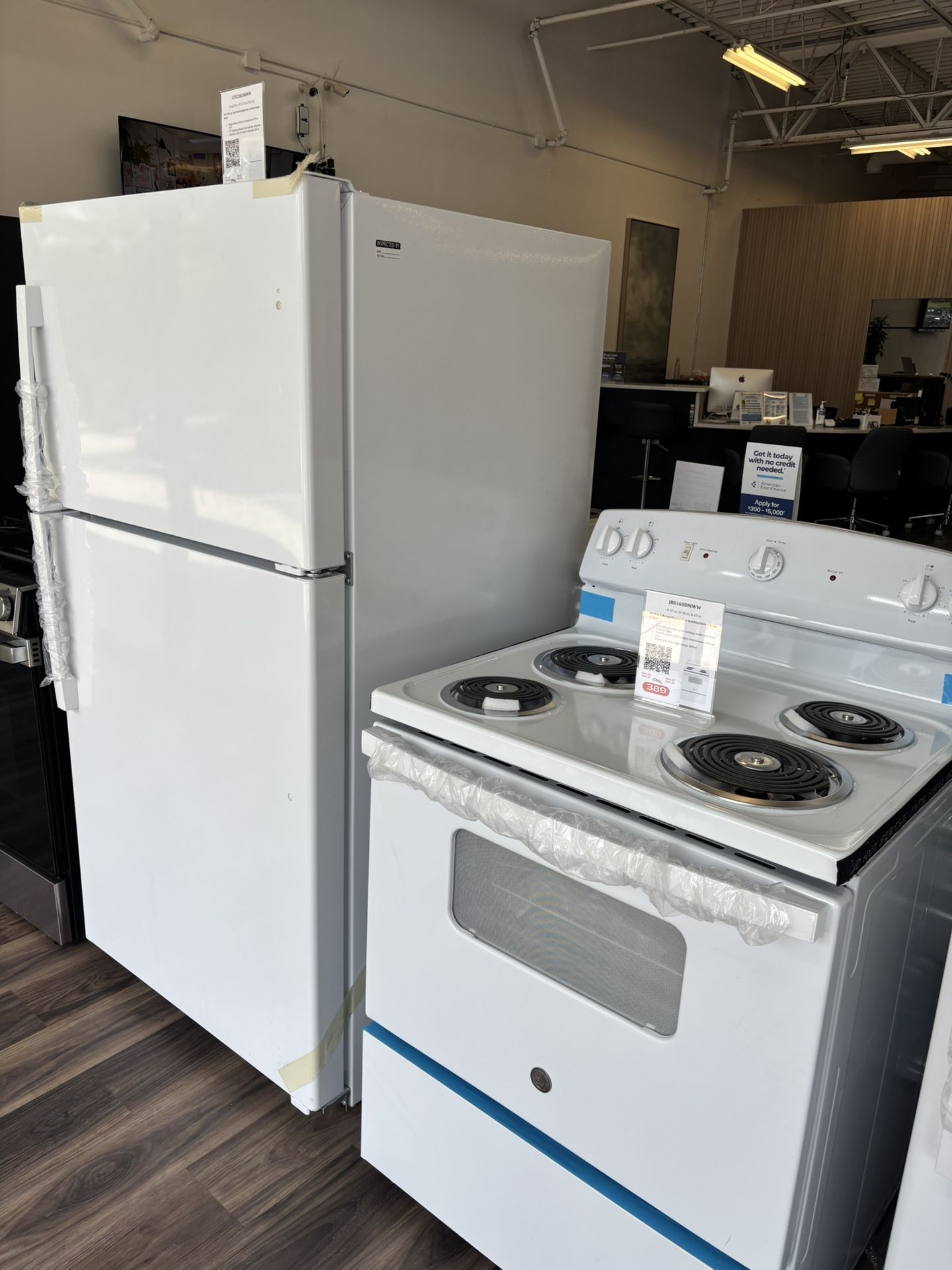 GE Top Freezer Refrigerator + Electric Range Bundle