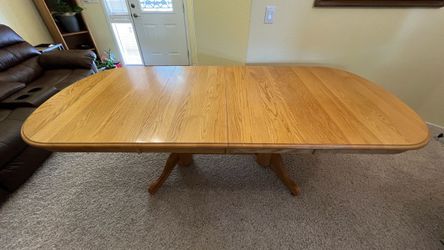 Dining table with 2 expansion leafs 96” L x 42” W