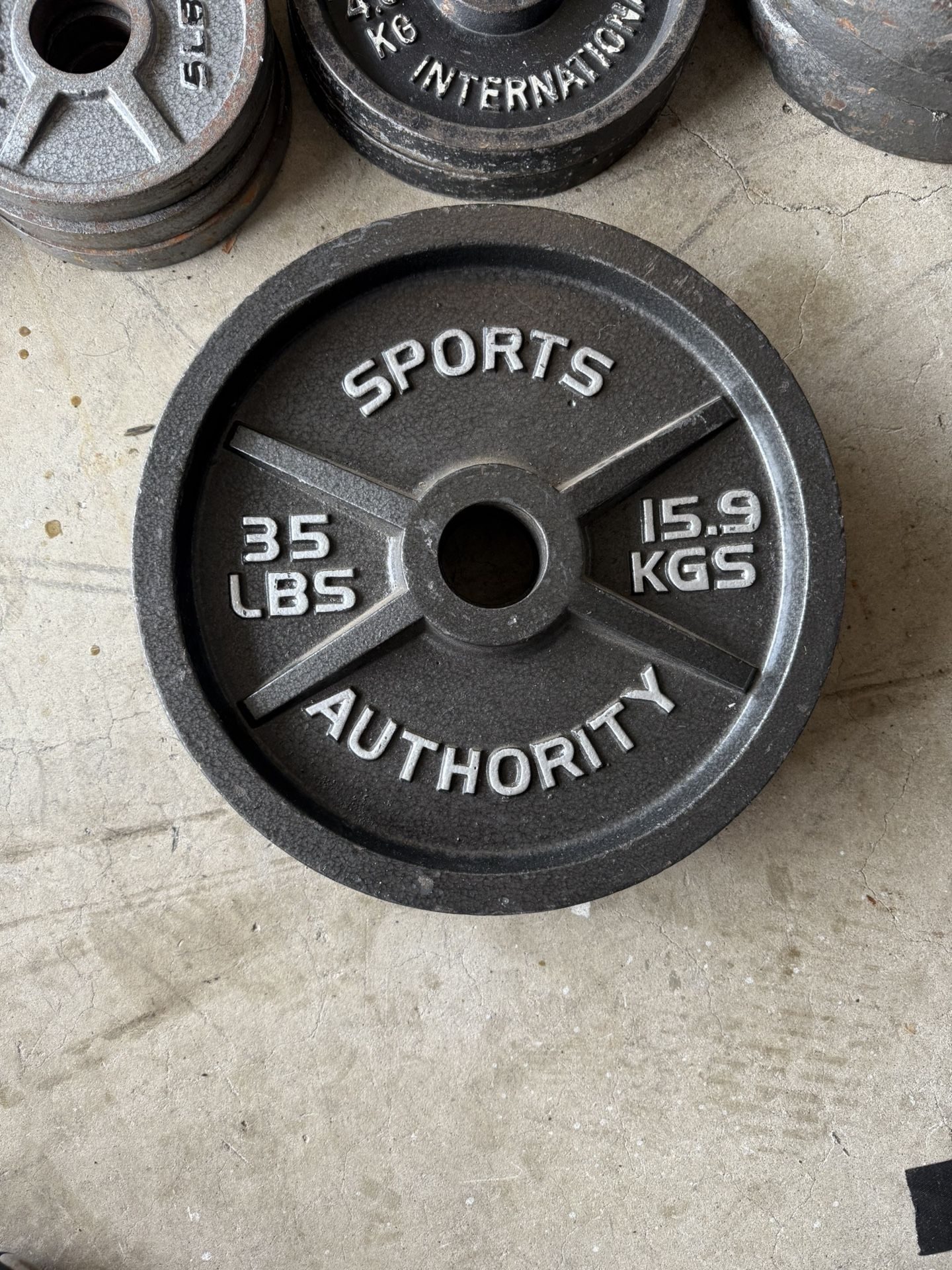 Set of two 35lbs Olympic barbell weight plates