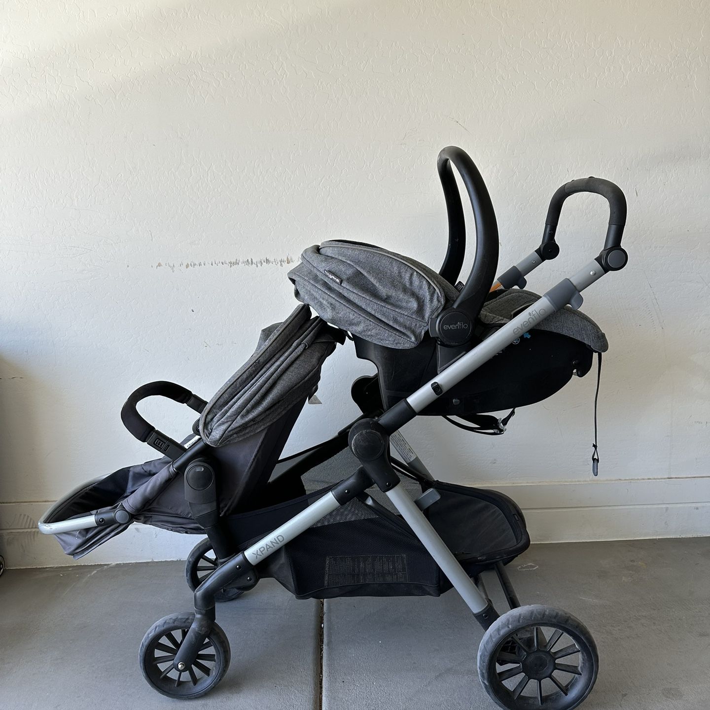 stokke black tripp trapp Stokke® Trapp® High Chair² trike with push handle making it durable and Test:60 Evenflo Pivot Infant Insert