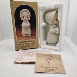 Precious Moments Wishing you a cozy Christmas Porcelain Figurine 1986 girl special 

Excellent Pre-owned condition,  no flaws, mint condition as it wa