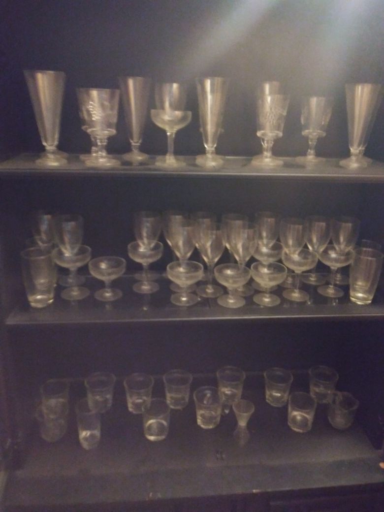 China cabinet with all the crystal glasses first hundred and fifty takes it all