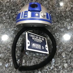 Disney parks  R2-D2 Light Up Headband Star Wars Galaxy's Edge Sound Effects Disney Parks silver.  Brand new with tags.