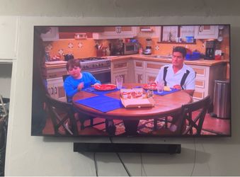 Samsung 75 inch TV with sound bar
