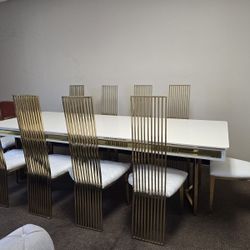 Stunning Modern Oversized Dining Table With 10 Gold Accented Chairs.