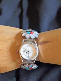 Women's kokopelli timepiece.