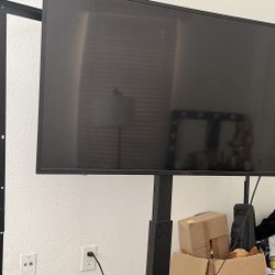 55inch Roku Smart Tv & Tv Stand 