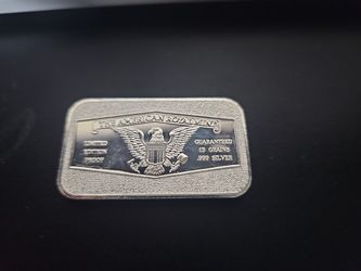 The AMERICAL EAGLE ROYAL MINT SILVER BAR .999 15 GRAINS