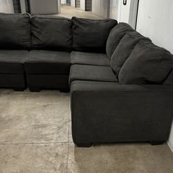 Black L shape sectional couch with some minor repairs ( $450 Delivery ) $350 for pick up 