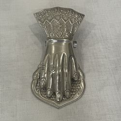 Decorative hand-shaped desk or wall clip by Two's Company.