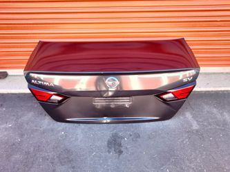 2019-2024 Nissan Altima complete trunk deck with lights and inner accessories OEM.