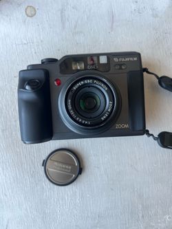 Fuji GA645zi with strap, original box and manuals.