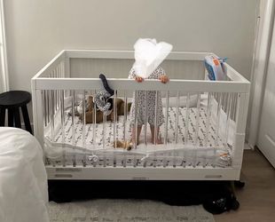 Free Linens, pillows, blankets, white modern crib already disassembled & inversion table.  Must go today!