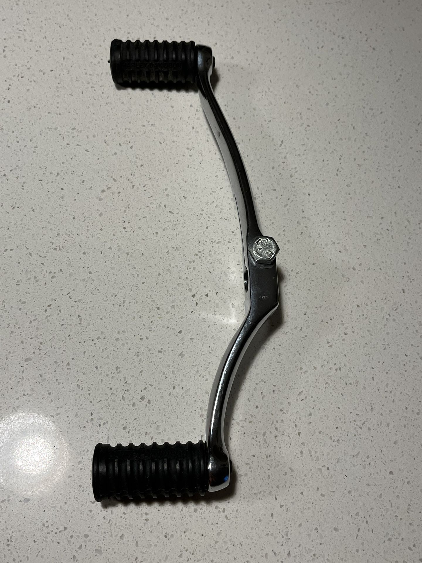 Brand New OEM Harley Davidson brand chrome Heel and Toe shifter lever with 2 Harley Davidson stamped rubber pads