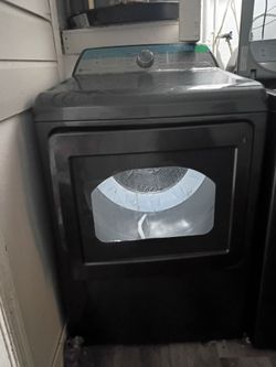 GE washer and dryer top loader washer a front loading dryer