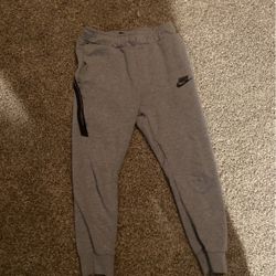 Nike tech fleece pants grey. size youth medium