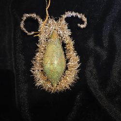 Antique Victorian Christmas OrnamentThis is an antique German Sebnitz tinsel glass Christmas ornament. 