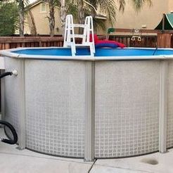 12 foot by 52 inch hard sided, salt water pool with brand new liner