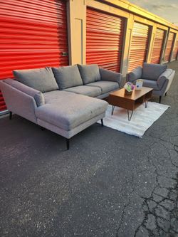 *Free delivery* Modern look light gray L sectional couch w/ matching chair. Couches only
