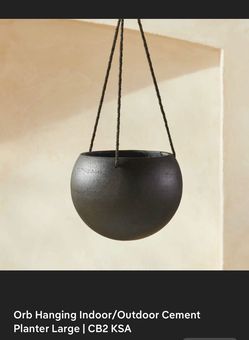 4 hanging pots. Plants. Garden planters. Indoor outdoor cement look. Black bought from CB2.