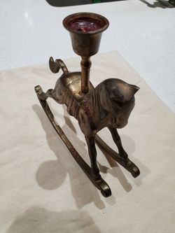 Horse attached with candle