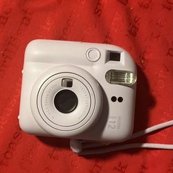 FujiFilm Instax Mini 12 camera (works well but has no film pack)
