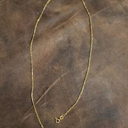 20" figgaro 14k gold chain 2.8 Grams size is in the photos it is solid not hollow
