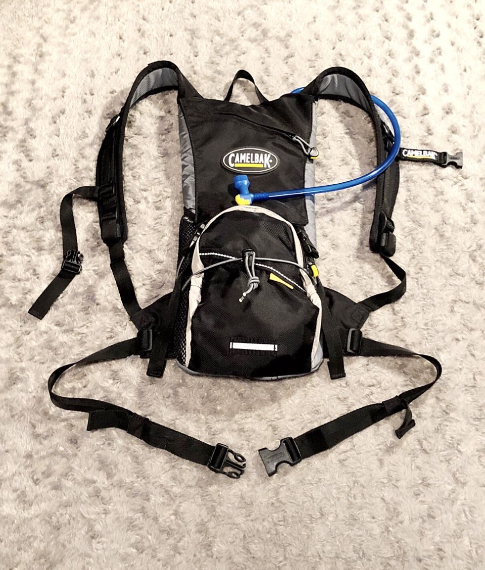 CamelBak LOBO 2L backpack Paid $85. Great condition! Comes with a 2L Omega Reservoir. It has a pull-out drinking tube that recesses back into the bac