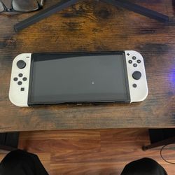 Nintendo Switch- OLED  Model With White Joy-con